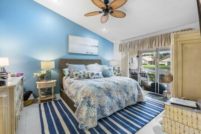 bedroom with access to exterior, light tile patterned floors, lofted ceiling, a ceiling fan, and a textured ceiling