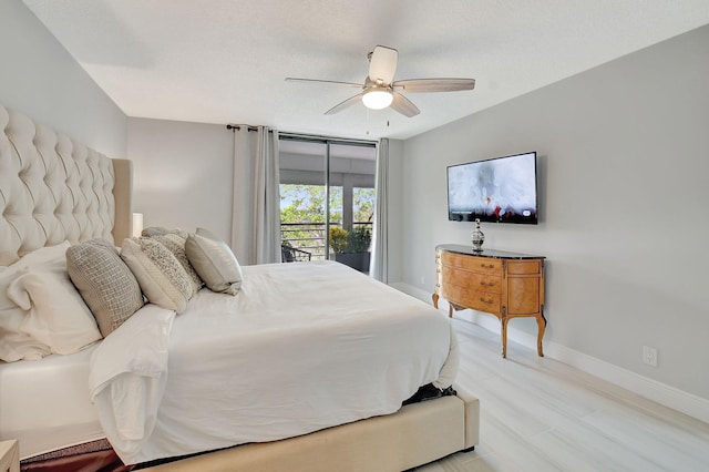 bedroom featuring access to exterior, light wood-style floors, ceiling fan, a textured ceiling, and baseboards