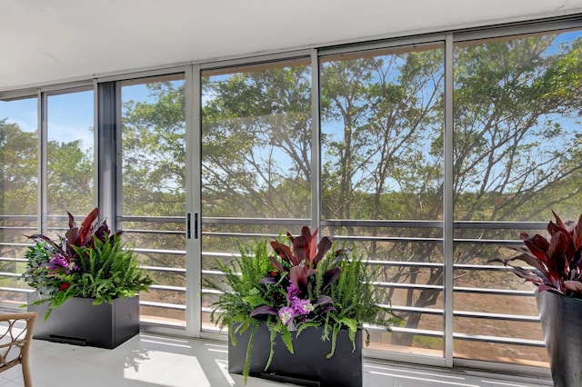 sunroom with plenty of natural light