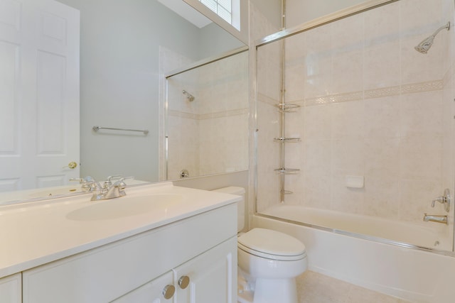 full bathroom featuring toilet, tile patterned floors, tub / shower combination, and vanity