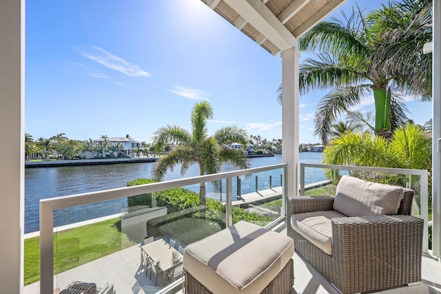 balcony featuring a water view