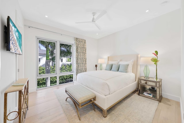 bedroom featuring recessed lighting, baseboards, light wood-type flooring, and ceiling fan