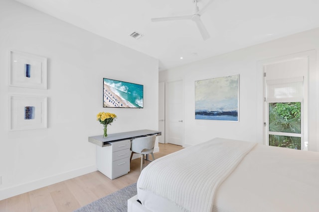 bedroom with ceiling fan, visible vents, baseboards, and light wood-style flooring