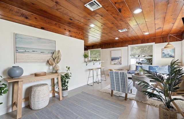 tiled living room with recessed lighting, wooden ceiling, visible vents, and baseboards