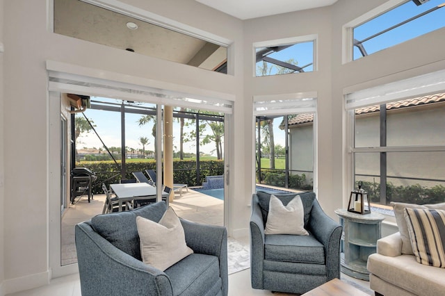 sunroom / solarium featuring a wealth of natural light