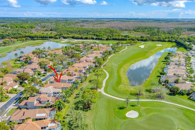 birds eye view of property with a residential view, a water view, and golf course view