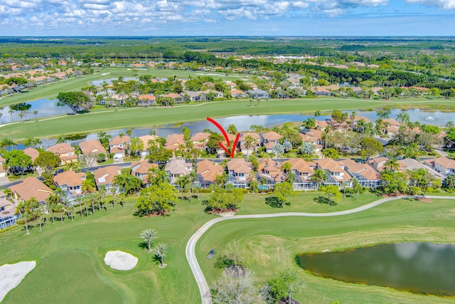 bird's eye view with a residential view, view of golf course, and a water view