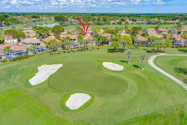 aerial view featuring a water view, a residential view, and golf course view