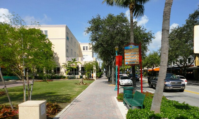 view of sport court featuring fence