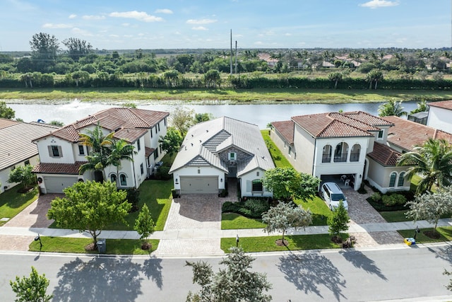 bird's eye view with a water view and a residential view