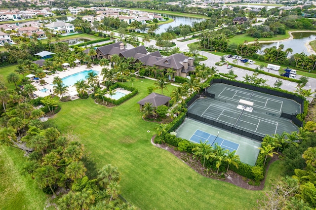 bird's eye view featuring a residential view and a water view