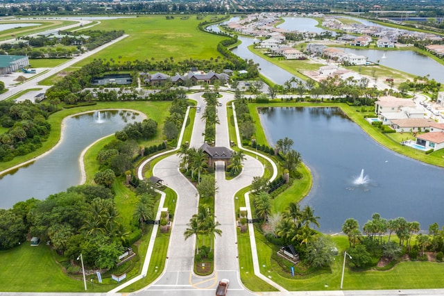 bird's eye view featuring a water view and a residential view