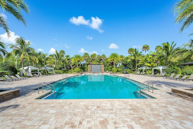 community pool featuring a patio area and a gazebo