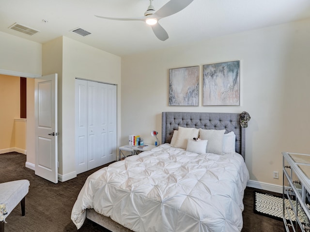 bedroom featuring carpet floors, a closet, visible vents, and baseboards