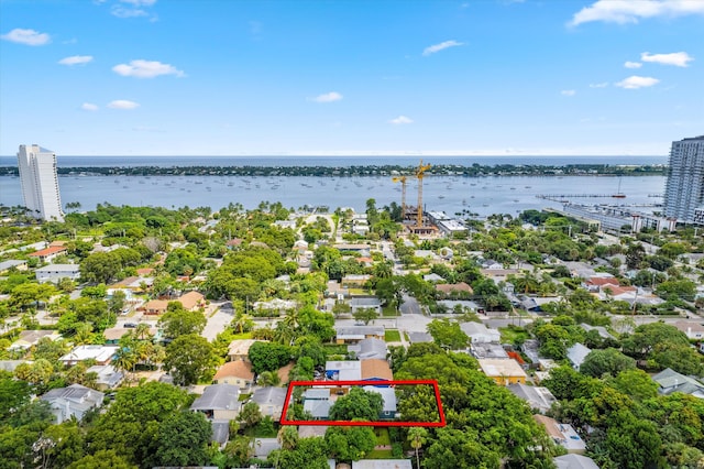 birds eye view of property featuring a water view