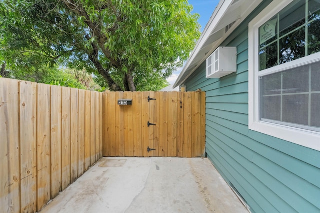 view of patio / terrace with a gate and fence