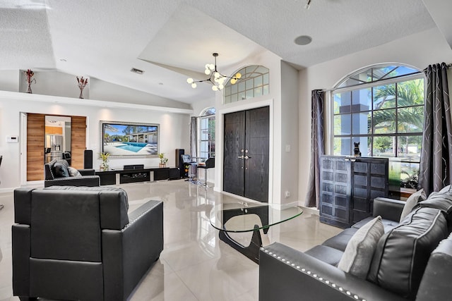 living room with a textured ceiling, a notable chandelier, visible vents, baseboards, and vaulted ceiling