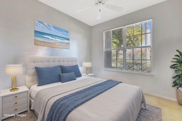 bedroom featuring carpet flooring, ceiling fan, and baseboards