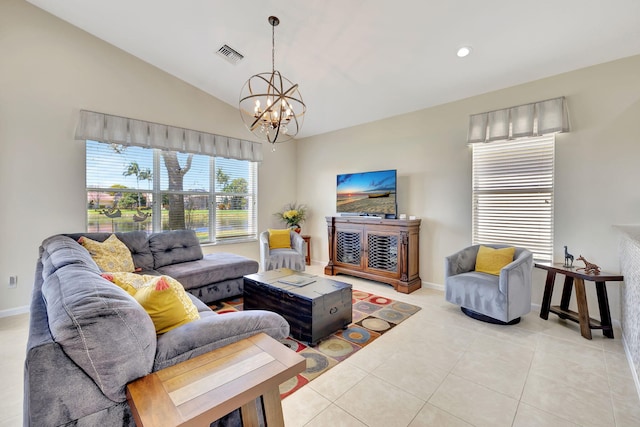 living room with lofted ceiling, light tile patterned floors, a notable chandelier, visible vents, and baseboards