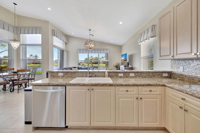 kitchen with dishwasher, a chandelier, vaulted ceiling, and a sink