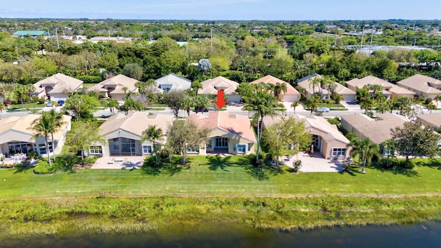 aerial view featuring a water view and a residential view