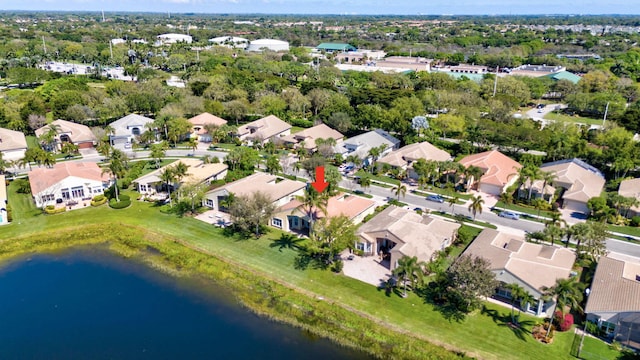 aerial view with a water view and a residential view