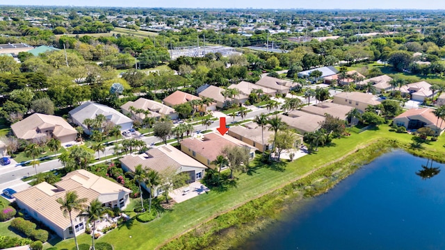 aerial view featuring a residential view and a water view