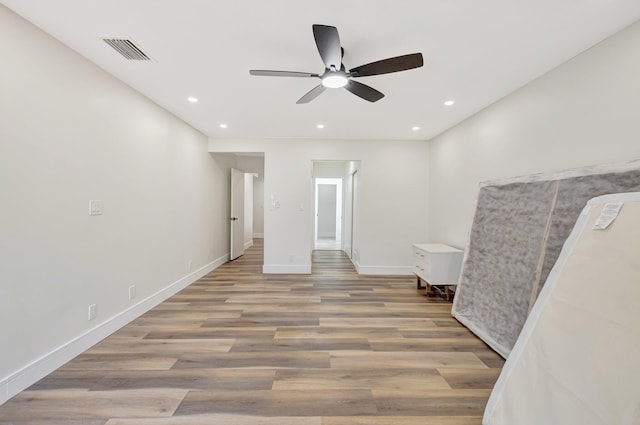 bedroom featuring recessed lighting, visible vents, baseboards, and light wood-style flooring