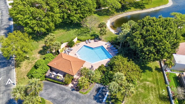 birds eye view of property featuring a water view