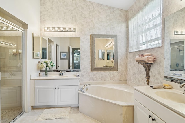 full bath with a garden tub, a stall shower, a sink, and wallpapered walls