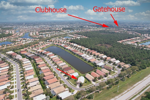 aerial view with a residential view and a water view