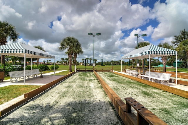 view of community featuring a lawn