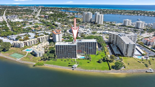 drone / aerial view with a water view