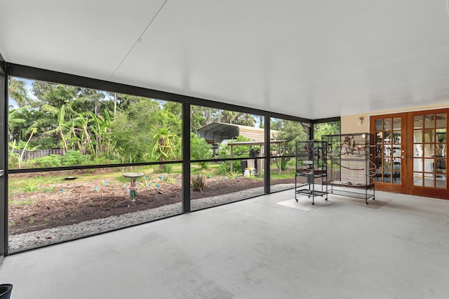 unfurnished sunroom featuring french doors