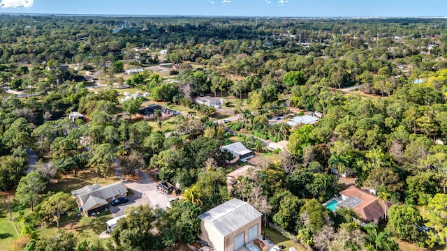 bird's eye view featuring a view of trees