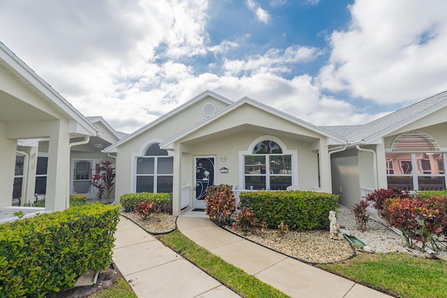 exterior space with stucco siding