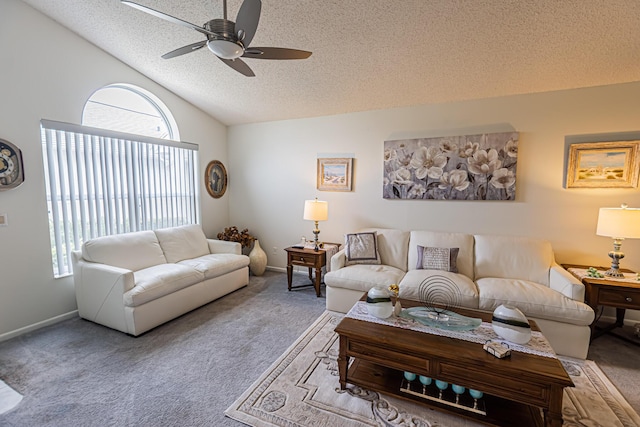 carpeted living room featuring a ceiling fan, vaulted ceiling, a textured ceiling, and baseboards