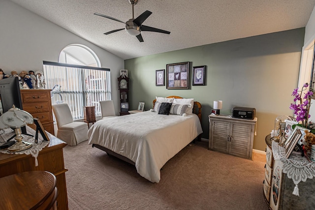 bedroom featuring lofted ceiling, light colored carpet, ceiling fan, and a textured ceiling