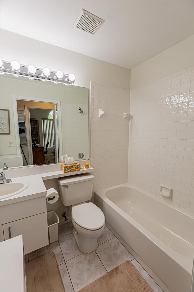 full bathroom featuring bathtub / shower combination, visible vents, vanity, and toilet