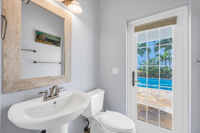 bathroom with a sink and toilet