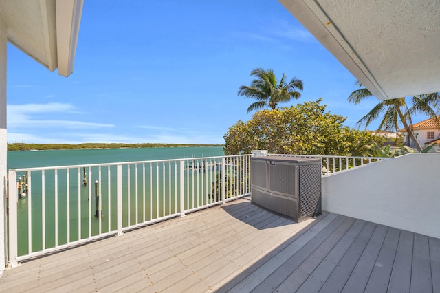 deck featuring a water view