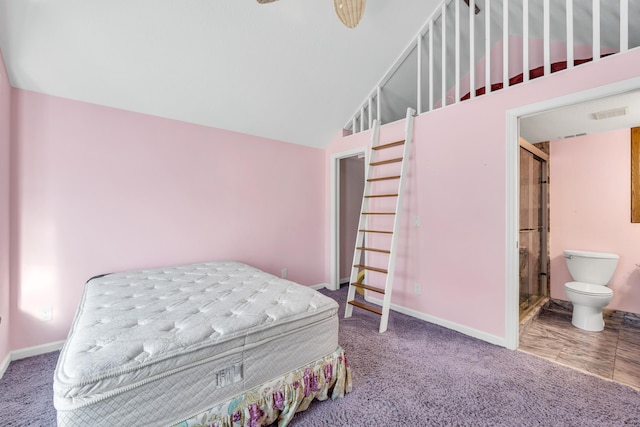 bedroom featuring visible vents, baseboards, carpet flooring, and ensuite bathroom