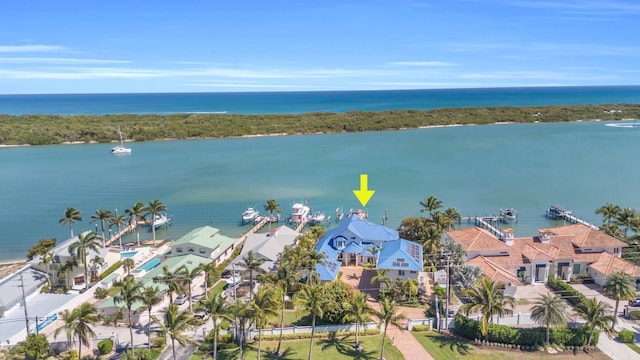 aerial view with a residential view and a water view