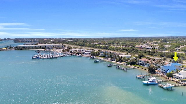 birds eye view of property featuring a water view