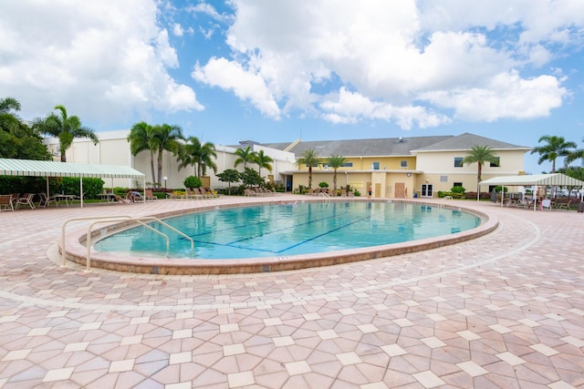 pool with a patio