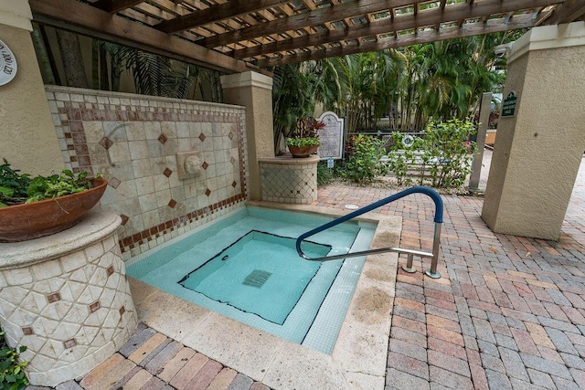 view of pool with a pergola