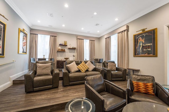 living area with a healthy amount of sunlight, baseboards, dark wood-style flooring, and crown molding