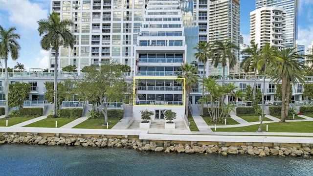 view of building exterior with a water view