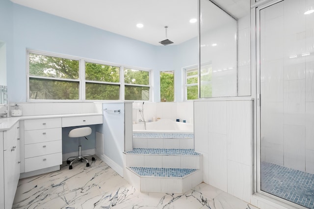 full bath with marble finish floor, recessed lighting, a bath, and a stall shower