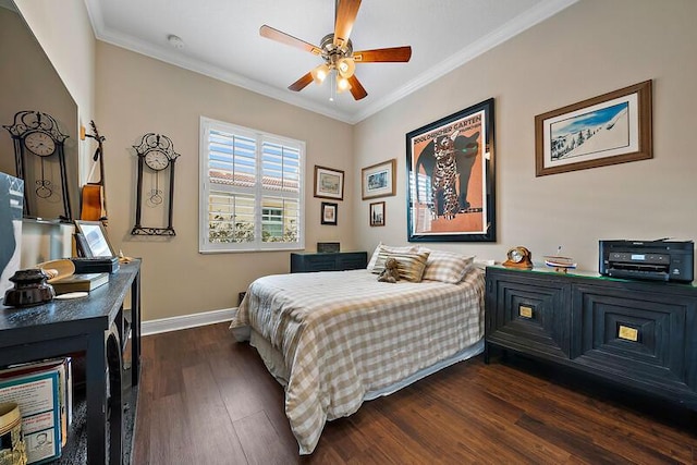 bedroom with ornamental molding, dark wood-type flooring, baseboards, and a ceiling fan